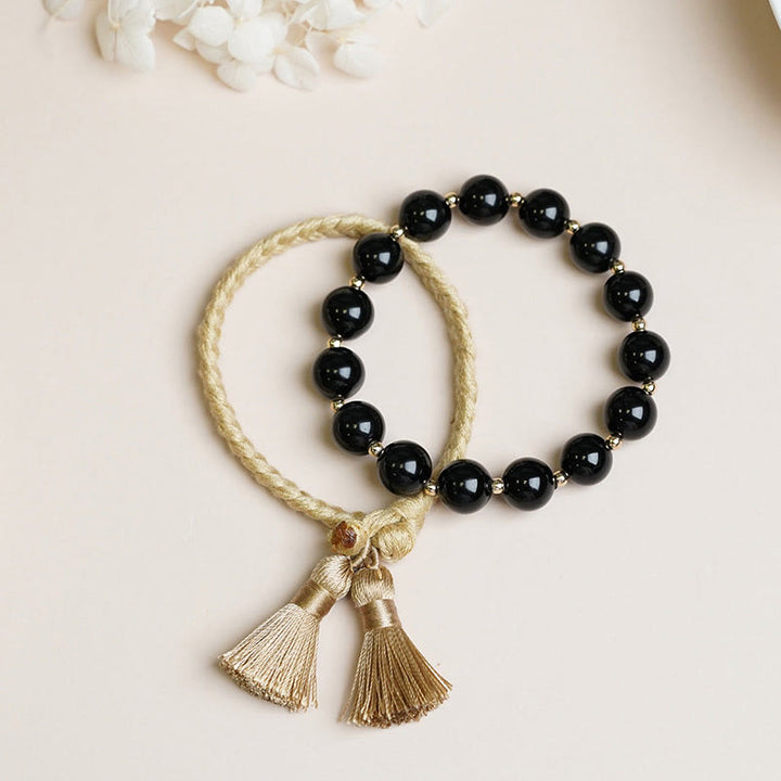 Braccialetto di supporto e protezione con perline di onice nero Buddha Stones 2 pezzi