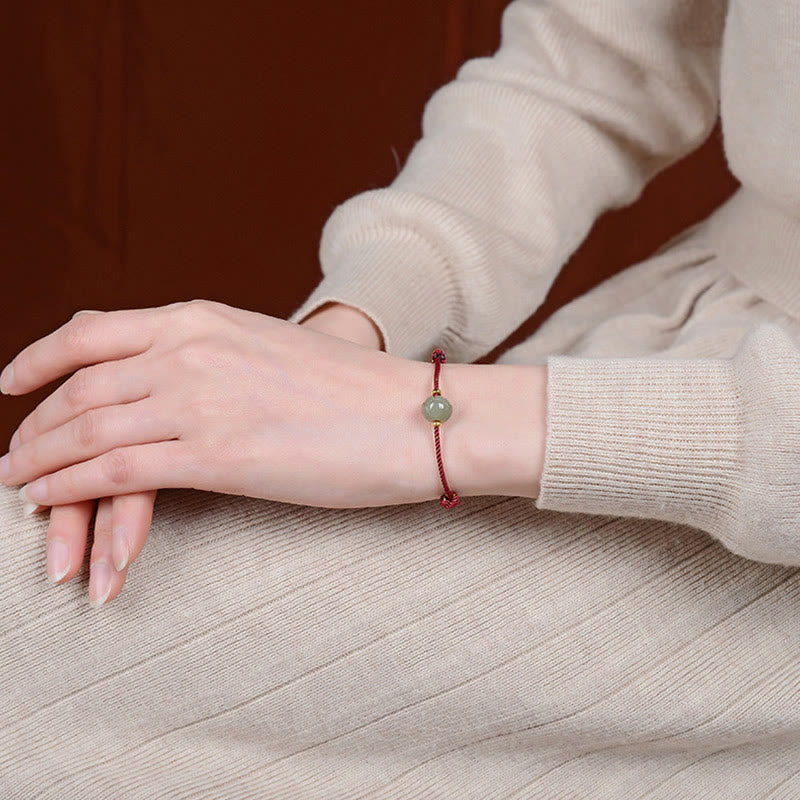 Bracciale Buddha Stones in argento sterling 925 placcato oro con giada Hetian e loto portafortuna in corda rossa