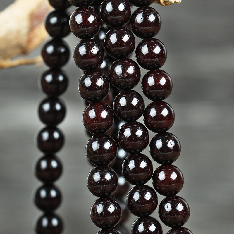 Braccialetto di protezione con nodo cinese in legno di sandalo rosso con piccola foglia e stella d'oro Buddha Stones