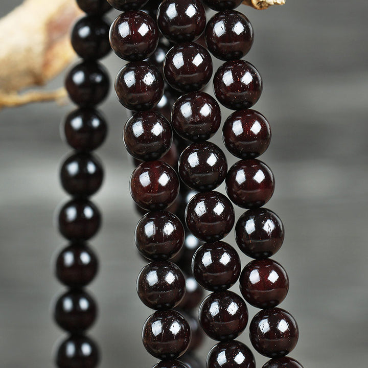 Braccialetto di protezione con nodo cinese in legno di sandalo rosso con piccola foglia e stella d'oro Buddha Stones
