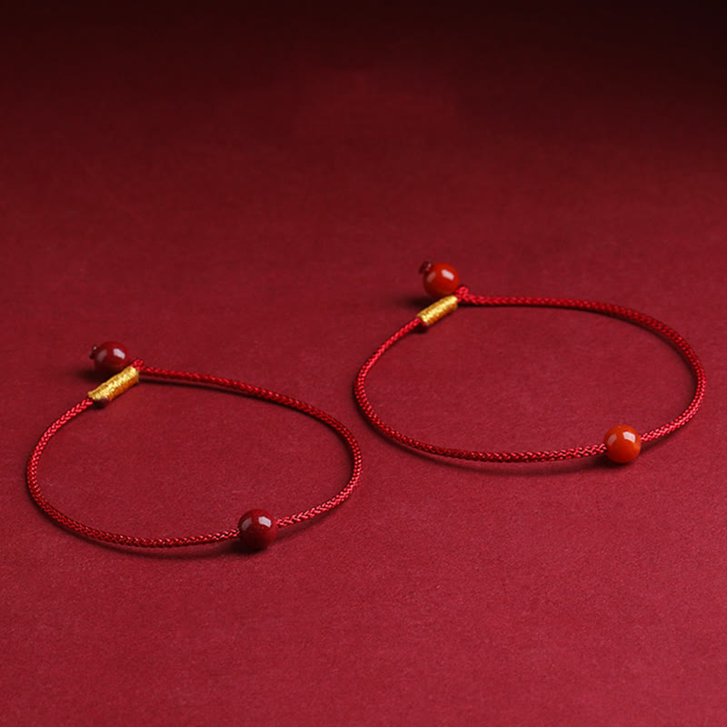 Braccialetto di corda rossa con benedizione in agata rossa naturale e cinabro Buddha Stones