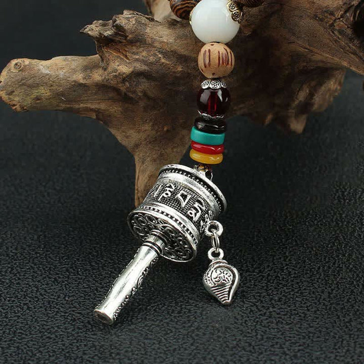 Buddha Stones Tibetano Om Mani Padme Hum Ruota della Preghiera Rotazione Vajra Collana Pendente in Legno - image 19
