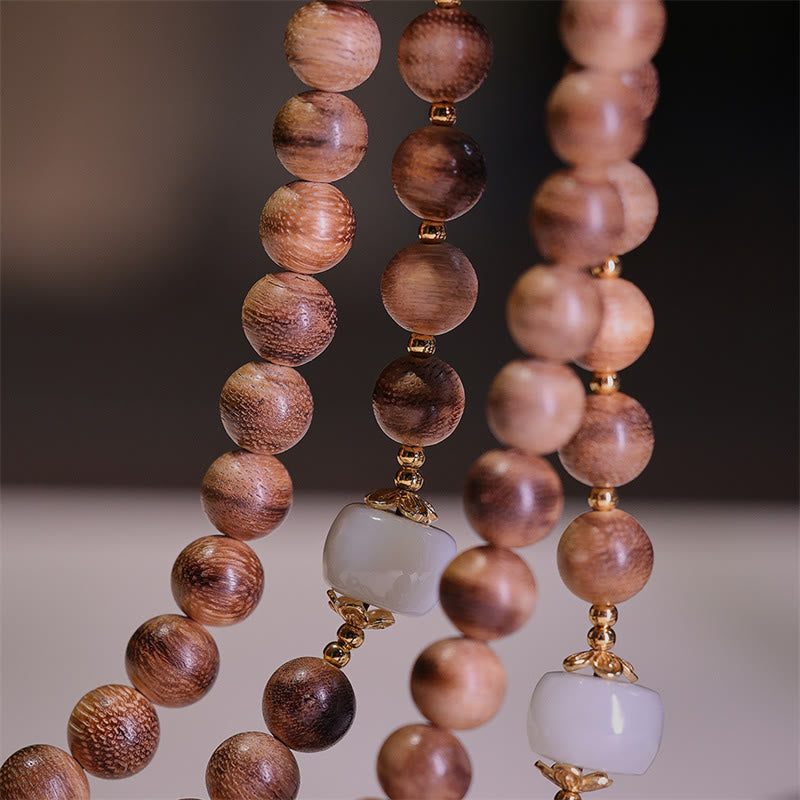 Braccialetto con ciondolo Ruyi in lingotto di giada ambrato naturale con Buddha Stones agarwood