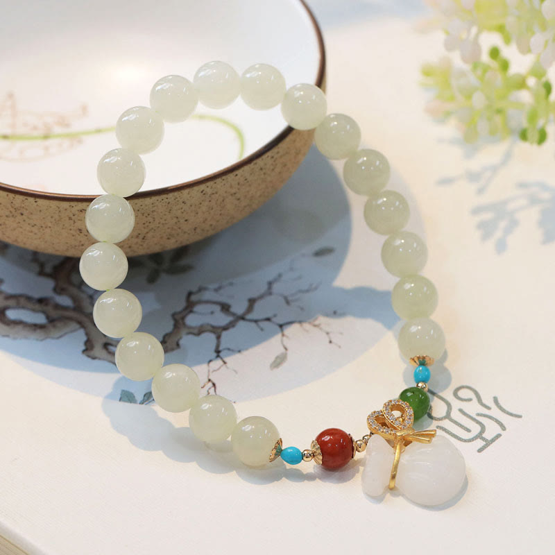 Braccialetto di benedizione con sacco di soldi placcato oro 14K in giada bianca naturale di Hetian Buddha Stones
