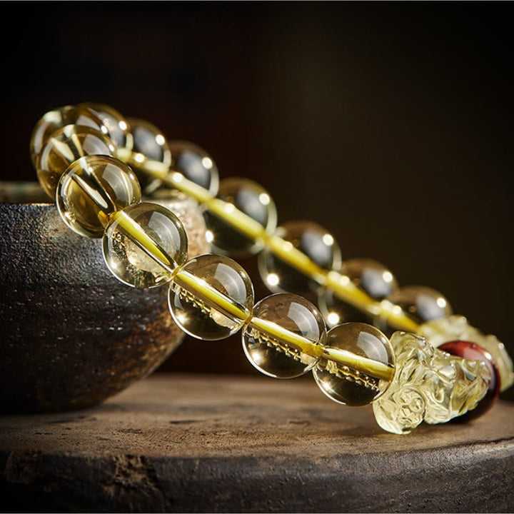 Braccialetto di protezione della prosperità con occhio di tigre PiXiu e citrino naturale Buddha Stones
