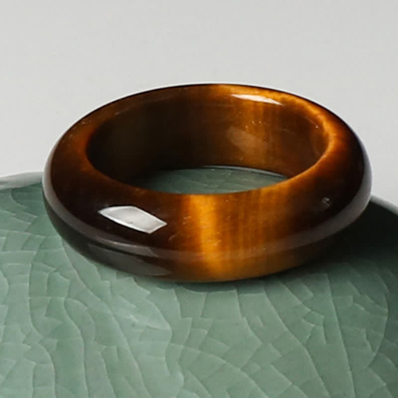 Anello di protezione della forza della pietra dell'occhio di tigre Buddha Stones