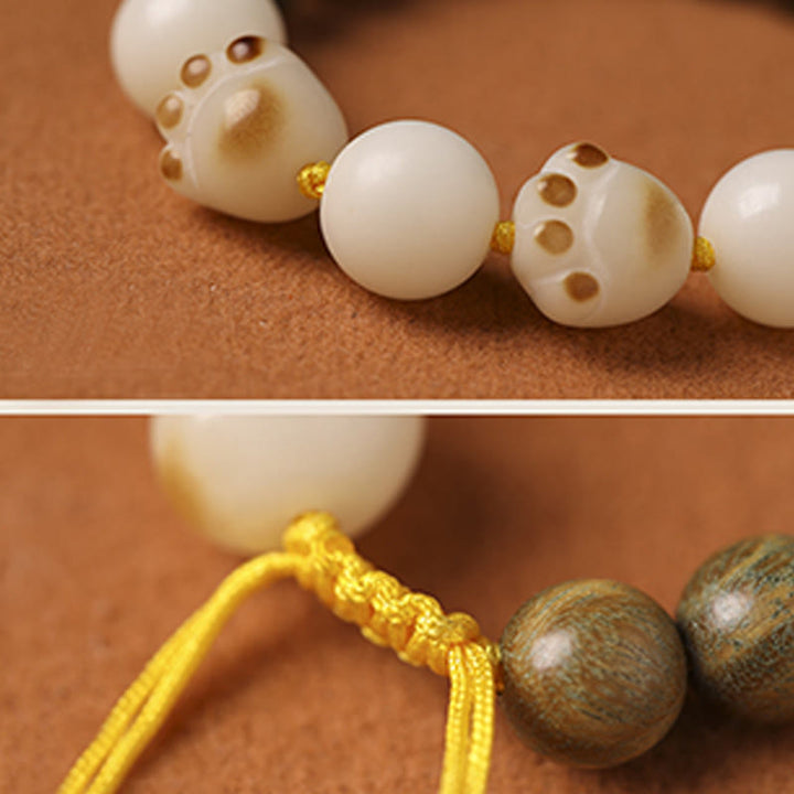 Braccialetto di cura per artigli di zampa di gatto con semi di Bodhi di sandalo verde naturale Buddha Stones - image 7