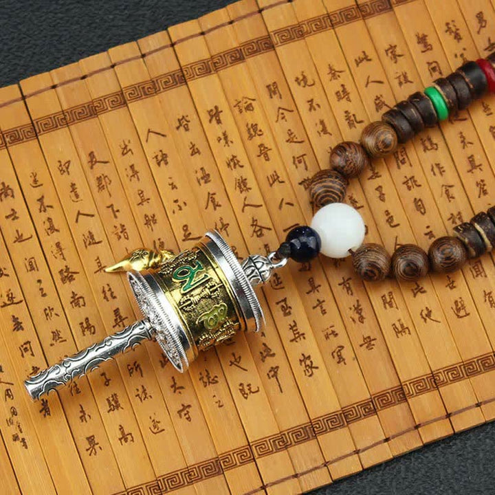 Buddha Stones Tibetano Om Mani Padme Hum Ruota della Preghiera Rotazione Vajra Collana Pendente in Legno - image 8