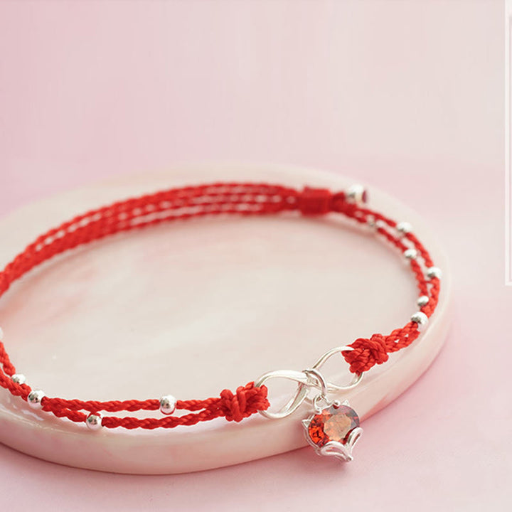 Cavigliera intrecciata con Buddha Stones, simbolo dell'amore, cuore e infinito