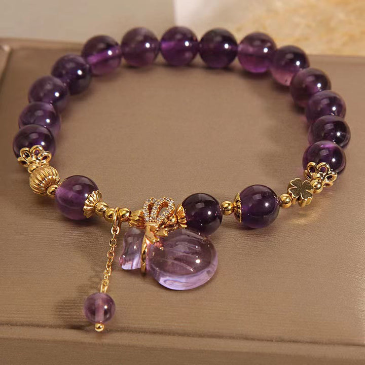 Braccialetto positivo con ciondolo a forma di borsa per soldi in cristallo di ametista naturale Buddha Stones