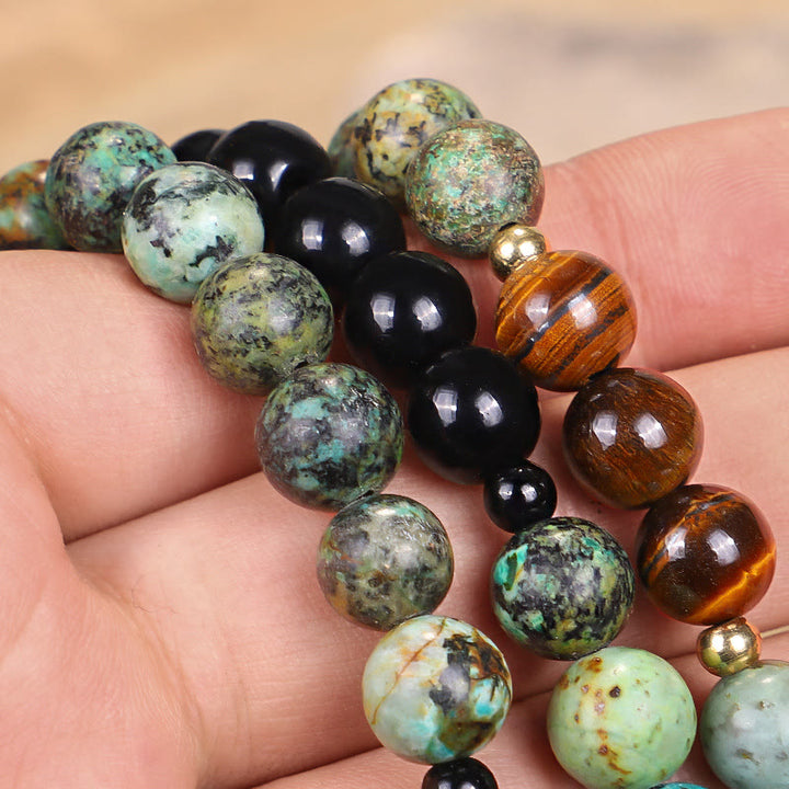 Buddha Stones 108 Mala Beads Pietra naturale Occhio di tigre Turchese Protezione Forza Bracciale Collana