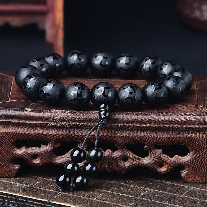 Braccialetto di meditazione Om Mani Padme Hum in onice nero e cristallo bianco del Tibet Buddha Stones
