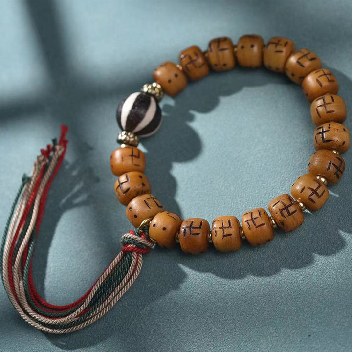 Buddha Stones naturale tibetano osso di cammello svastica Dzi perlina Shankha Buddha fascino Kirtimukha braccialetto con nappa protezione fortuna