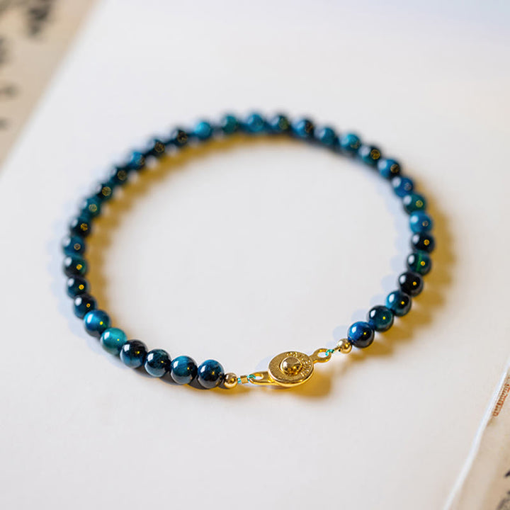 Braccialetto di protezione con catena in pietra naturale occhio di tigre blu Buddha Stones