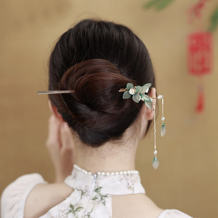 Forcina per capelli con nappa di pace, foglia e perla