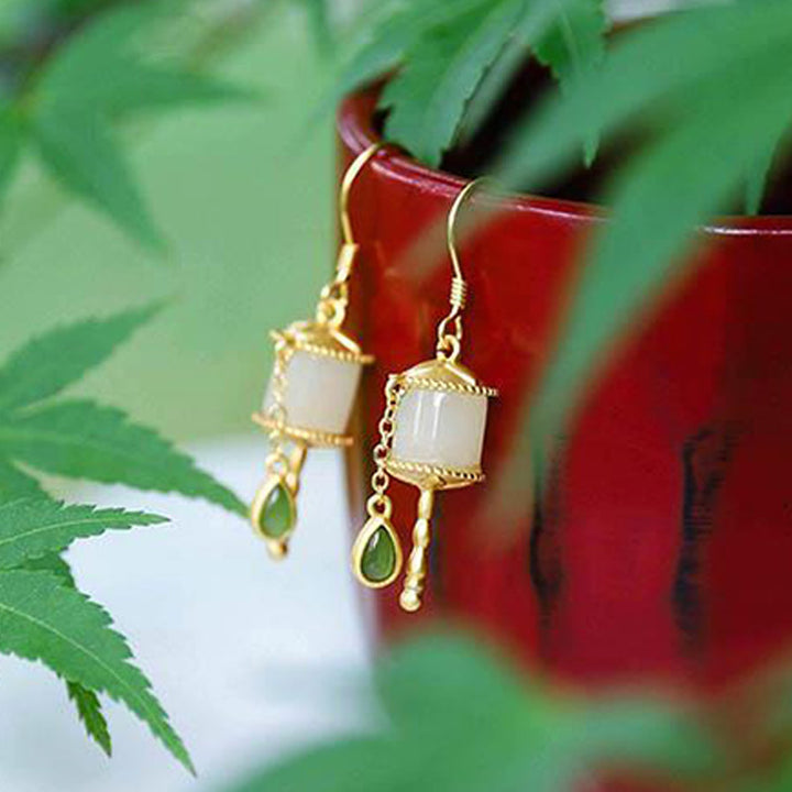 Orecchini pendenti con ruota della preghiera in giada e argento sterling 925 Buddha Stones