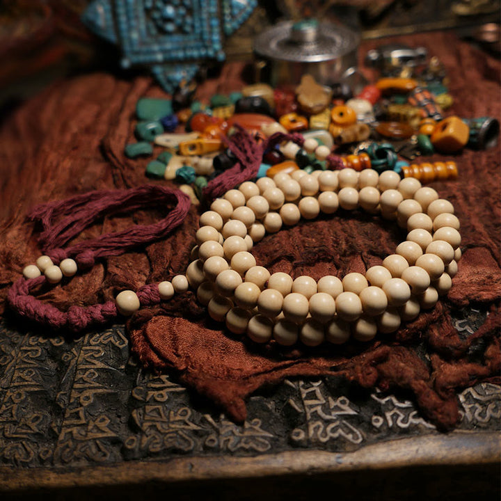 Buddha Stones 108 Mala Perle Abelia Biflora Legno Allontanando gli Spiriti Maligni Polso Mala