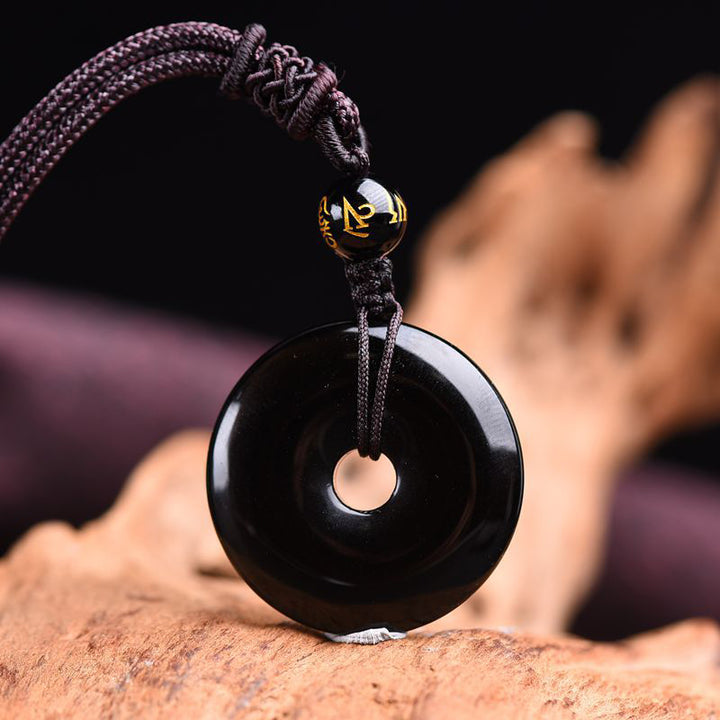 Collana di protezione in ossidiana tibetana Buddha Stones