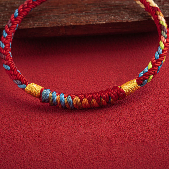 Bracciale multicolore Buddha Stones "Possa tu essere al sicuro e fortunato nell'anno a venire"