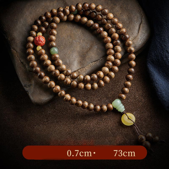 Buddha Stones 108 perle di Mala Kalimantan Agarwood Zucca Giada Ambra Bracciale equilibrio