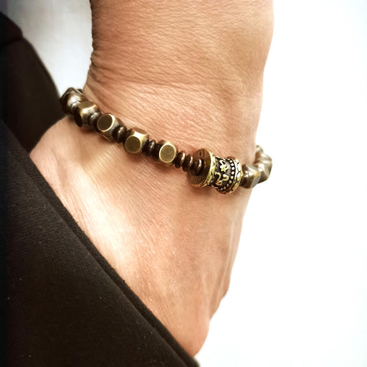 Buddha Stones Tibetano Om Mani Padme Hum Amuleto in ottone intagliato in rame Focus Bracciale