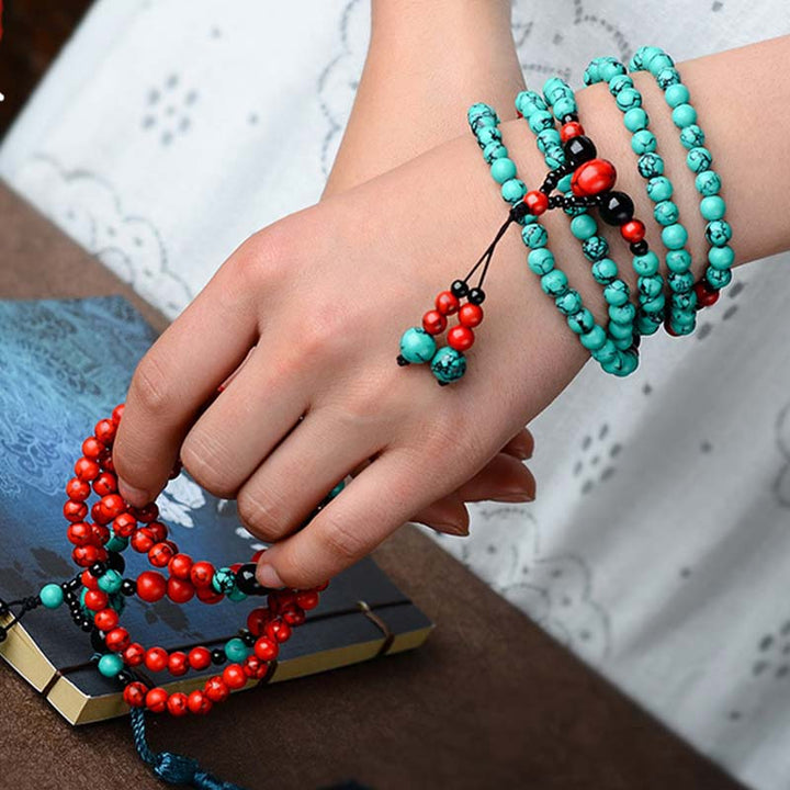 Braccialetto di protezione con perline di turchese rosso e onice nero Buddha Stones