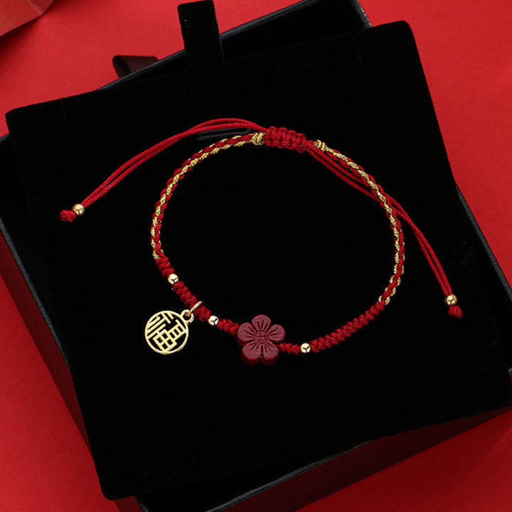 Braccialetto intrecciato con corda e carattere Fu, fiore di cinabro e Buddha Stones