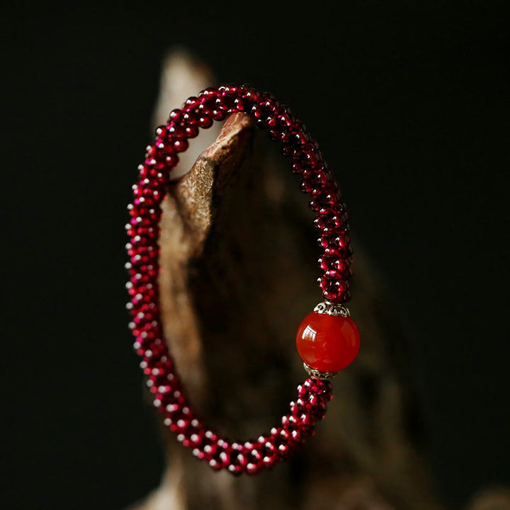 Braccialetto di protezione con perline di agata rossa, cristallo rosa e granato naturale Buddha Stones