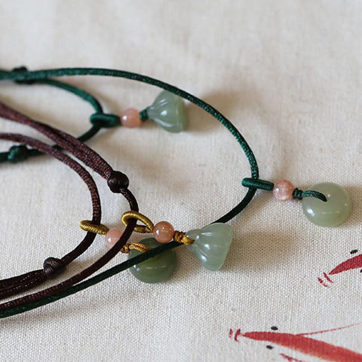 Collana con ciondolo in corda con fibbia della pace in giada rotonda naturale Buddha Stones Lotus Abundance - image 15