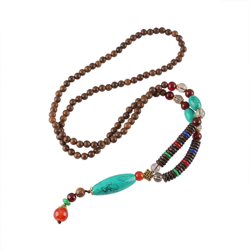 Collana con ciondolo in pietra turchese, pietra di legno di wenge, protezione e calma Buddha Stones