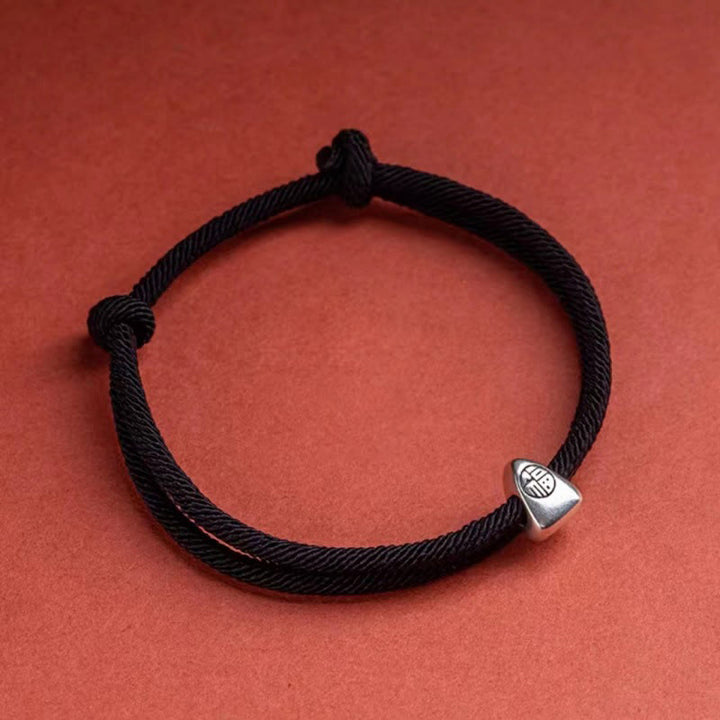 Bracciale intrecciato fatto a mano con carattere Fu in argento sterling 925 Buddha Stones
