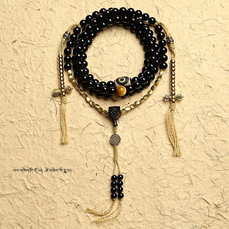 Buddha Stones Tibetano 108 Mala Beads Onice Nero Tre Occhi Dzi Beads Bracciale di Protezione