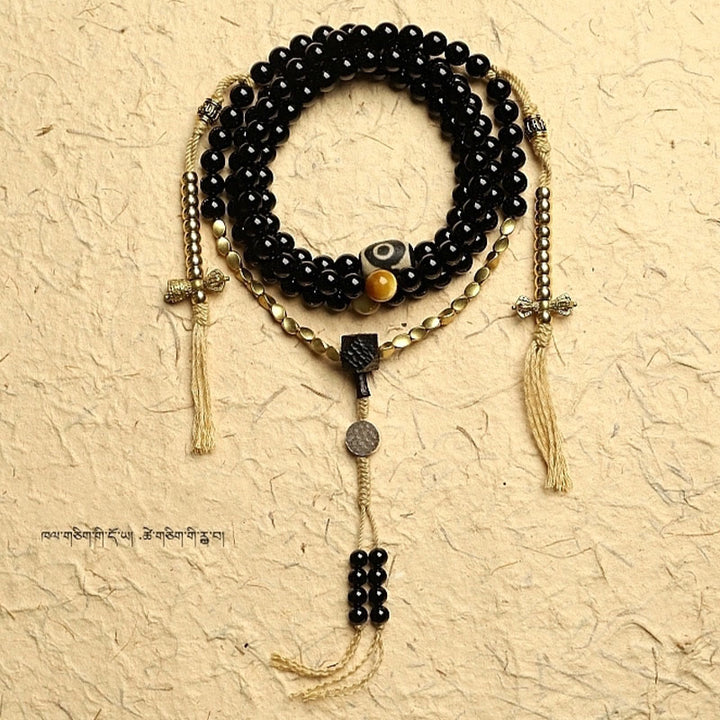 Buddha Stones Tibetano 108 Mala Beads Onice Nero Tre Occhi Dzi Beads Bracciale di Protezione