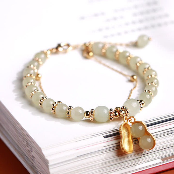 Braccialetto con ciondolo a forma di arachide Good Things Happen in argento sterling 925, giada naturale di Hetian