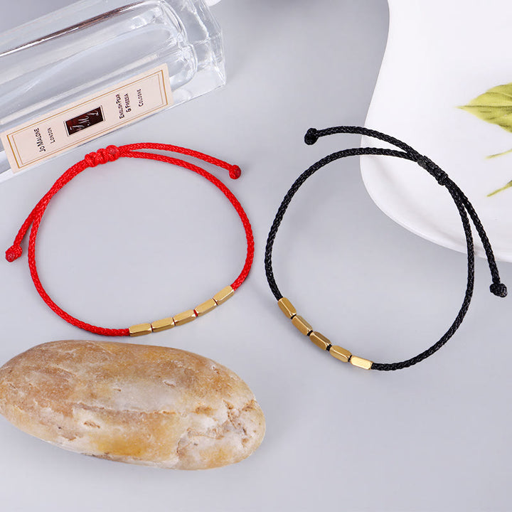 Braccialetto di corda intrecciata con protezione in perline di rame fatte a mano Buddha Stones