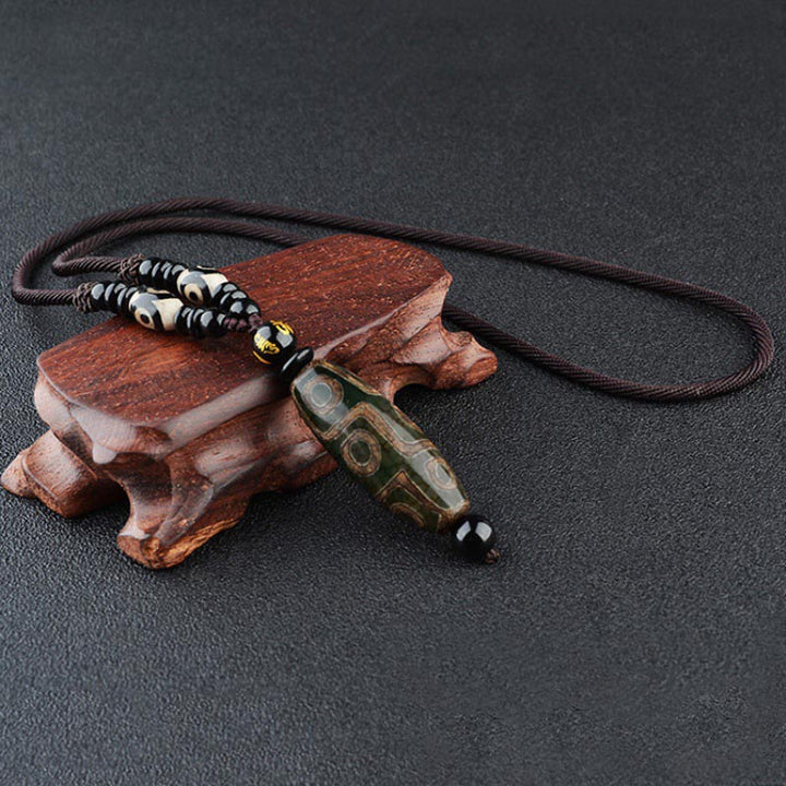 Collana di protezione della ricchezza con perline Dzi a nove occhi Buddha Stones - image 6