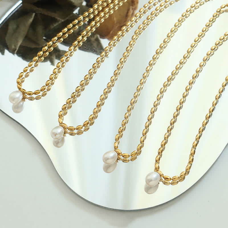 Collana con ciondolo di perle e perle della pace