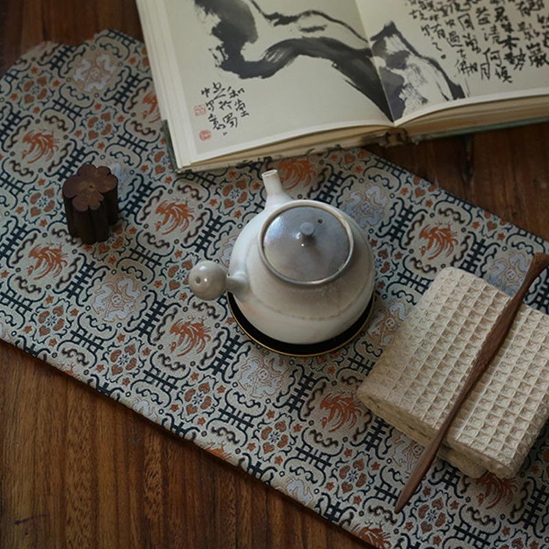 Elegante sottobicchiere per tazza da tè con motivo broccato floreale