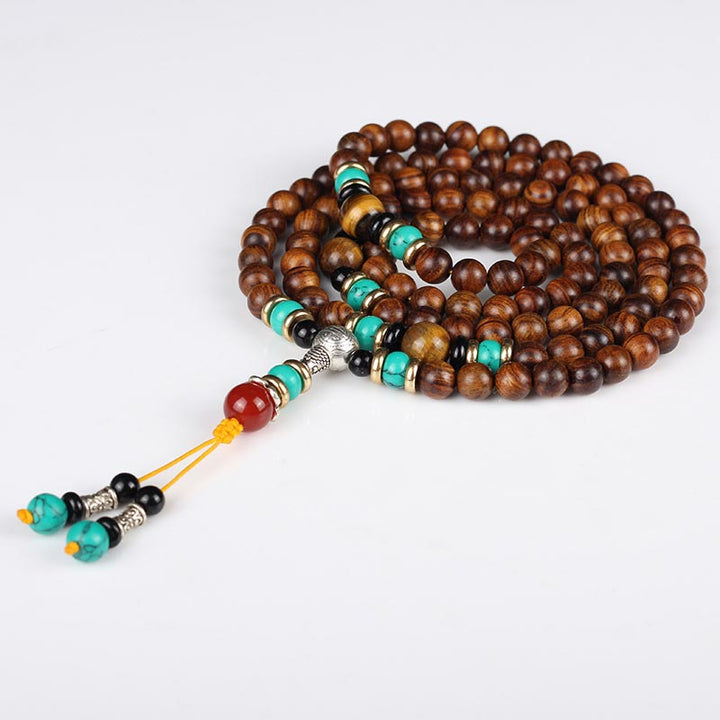 Braccialetto di guarigione Mala con 108 perle di occhio di tigre e legno di palissandro Buddha Stones