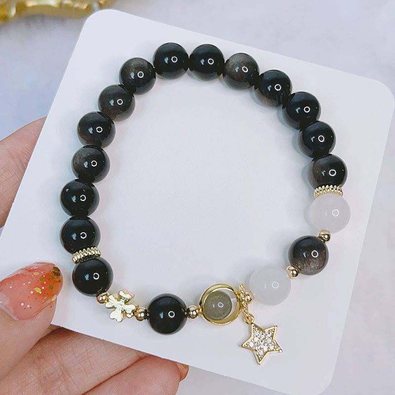 Braccialetto di protezione con cuore, stella e fiore in ossidiana naturale con Buddha Stones argento lucido