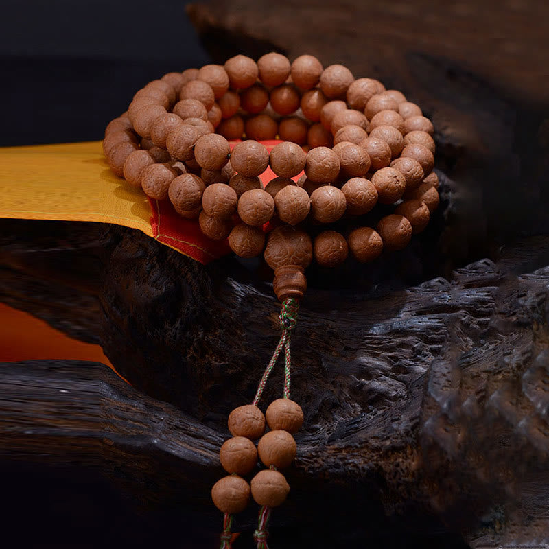 Buddha Stones 108 Mala Beads Nepal Bodhi Seed Fortuna Ricchezza Braccialetto con Nappa - image 1