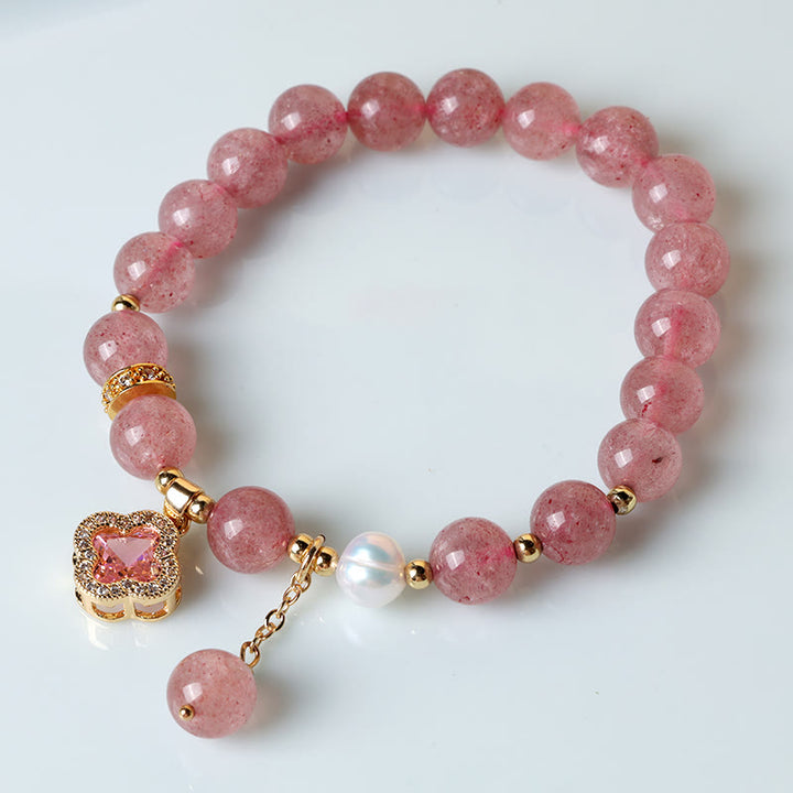 Braccialetto di guarigione con ciondolo a forma di quadrifoglio, perla e quarzo fragola Buddha Stones