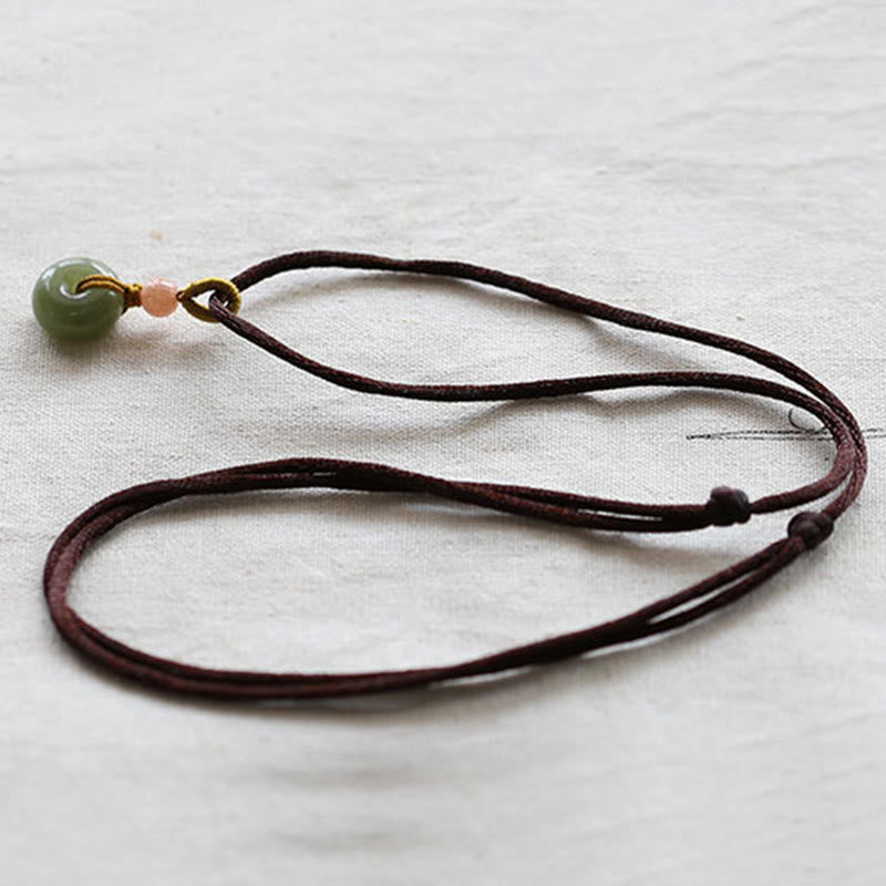 Collana con ciondolo in corda con fibbia della pace in giada rotonda naturale Buddha Stones Lotus Abundance - image 12
