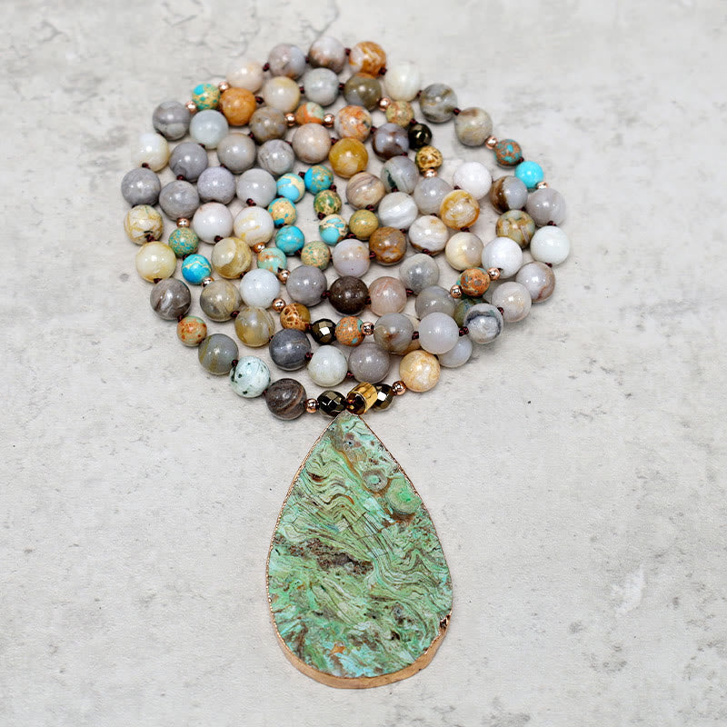 Collana di perline di guarigione in diaspro Picasso naturale dell'oceano Buddha Stones