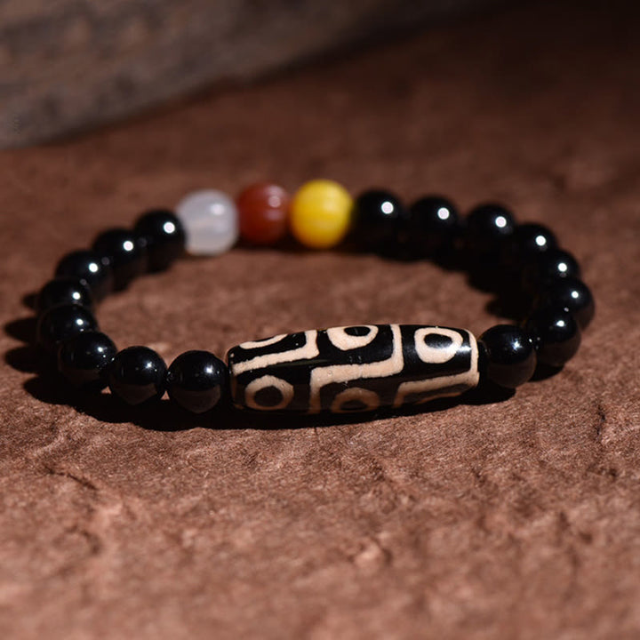 Braccialetto di potere della ricchezza con perline Dzi a nove occhi naturali tibetane Buddha Stones