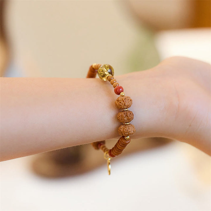 Buddha Stones Semi di Bodhi Tibetano Onice Nero Quarzo Fumé Om Mani Padme Hum Fu Carattere Bracciale Ricchezza