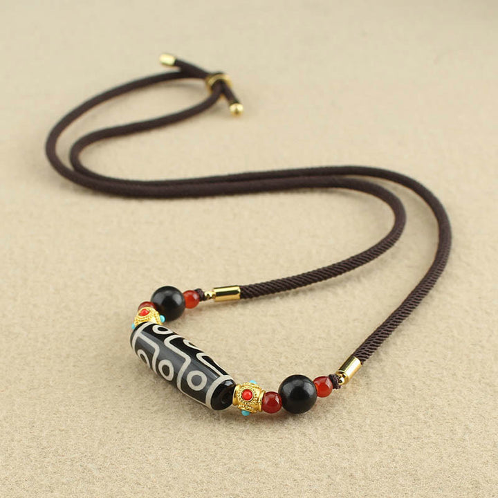 Buddha Stones Tibetano Nove Occhi Dzi Bead Protezione Benedizioni Collana Pendente