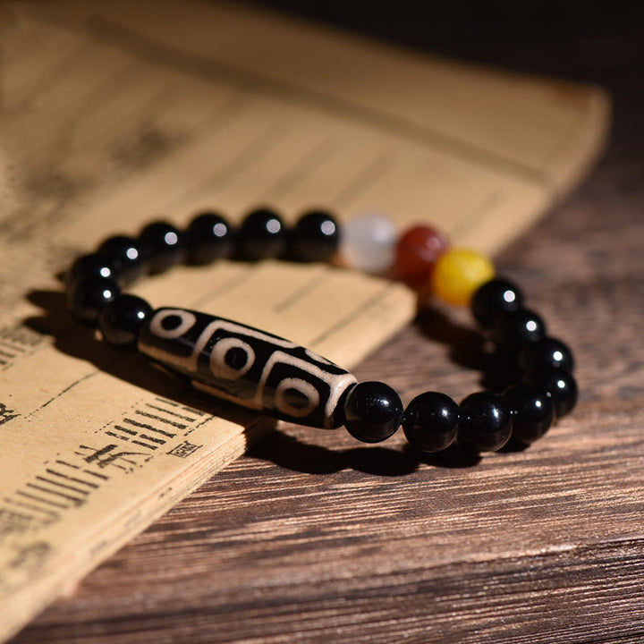 Braccialetto di potere della ricchezza con perline Dzi a nove occhi naturali tibetane Buddha Stones