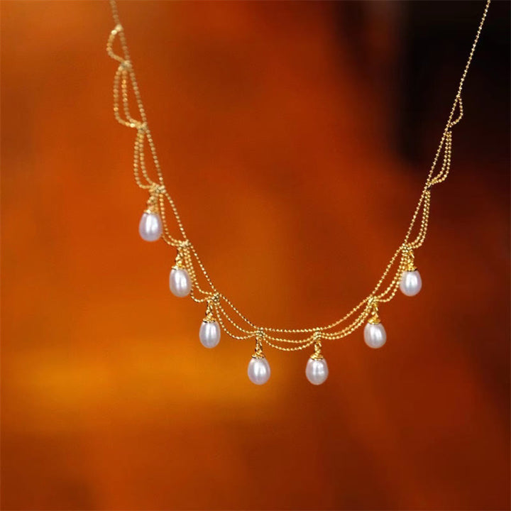 Collana con ciondolo multistrato di perle curative placcate in oro 14K vintage
