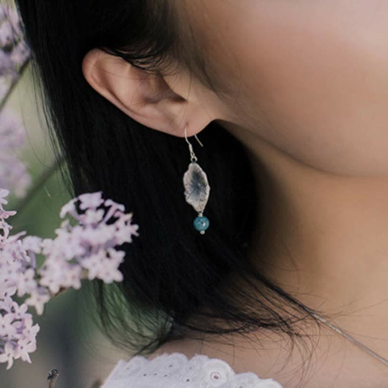 Orecchini pendenti con protezione a forma di foglia di loto turchese in argento sterling 925 Buddha Stones